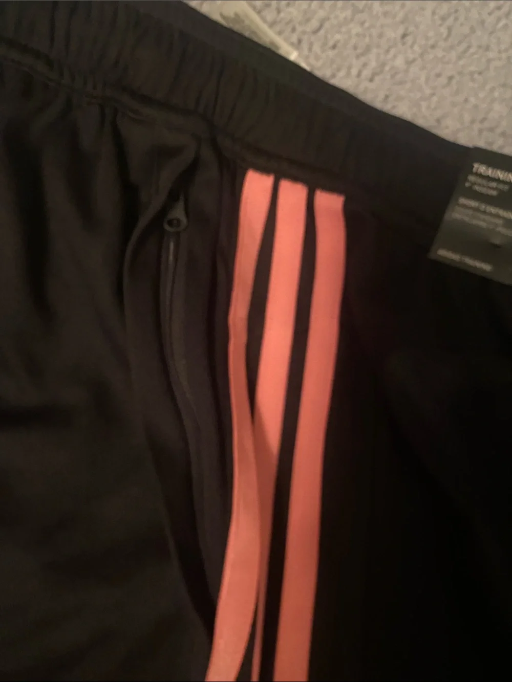 Adidas Black Shorts with Pink Stripe Detailing with zipper pockets
